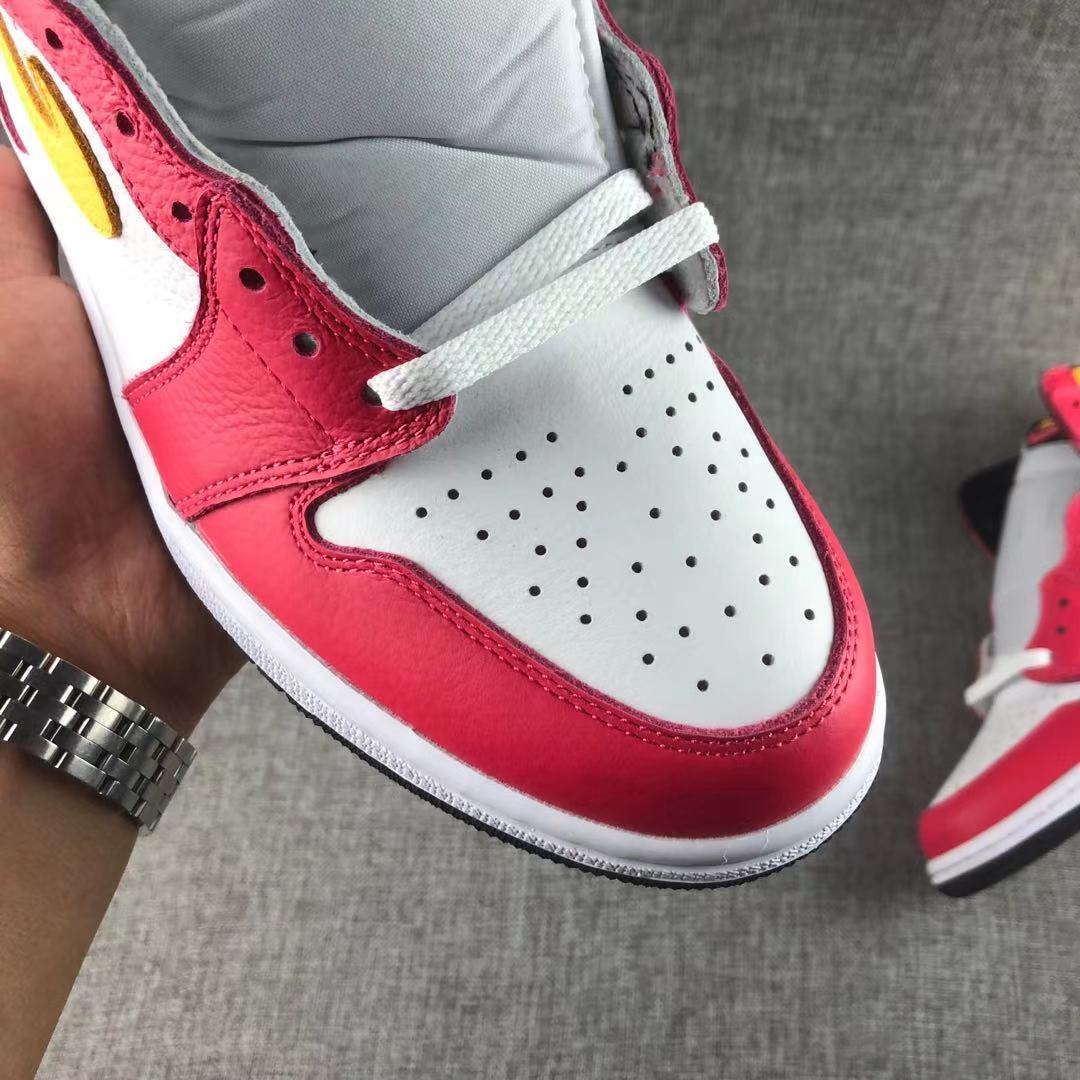Air Jordan 1 High OG Light Fusion Red Sneakers 555088-603 - product image from the listing.