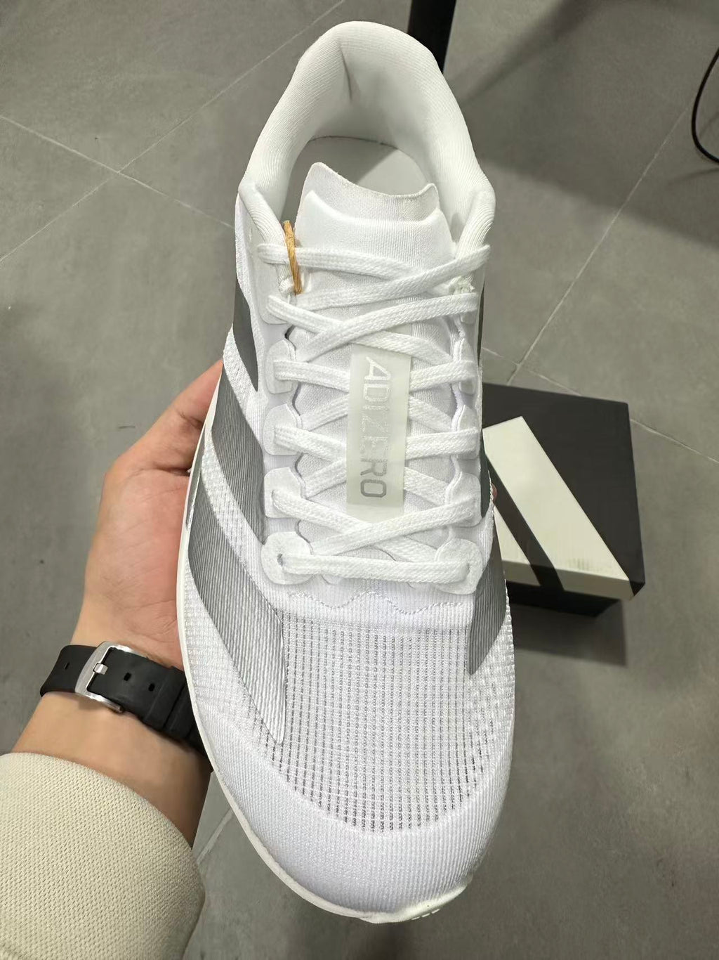 adidas Lightstrike Pro Running Shoes in White JR6207 - product image from the listing.