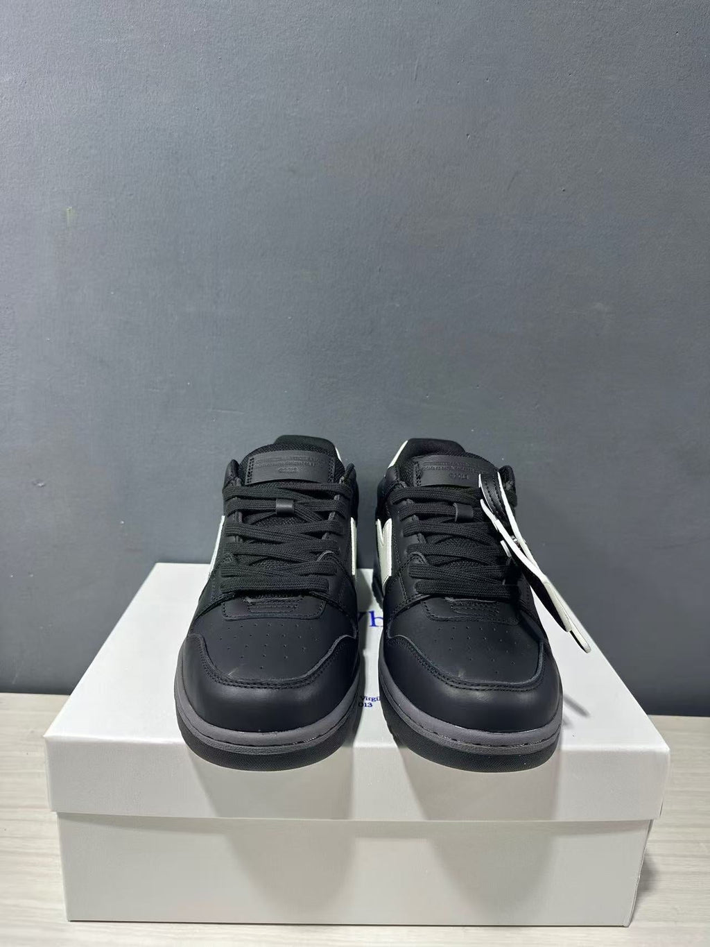 Off-White Out Of Office Low-Top Sneakers in Black White OWIA189C99LEA0061001 - product image from the listing.