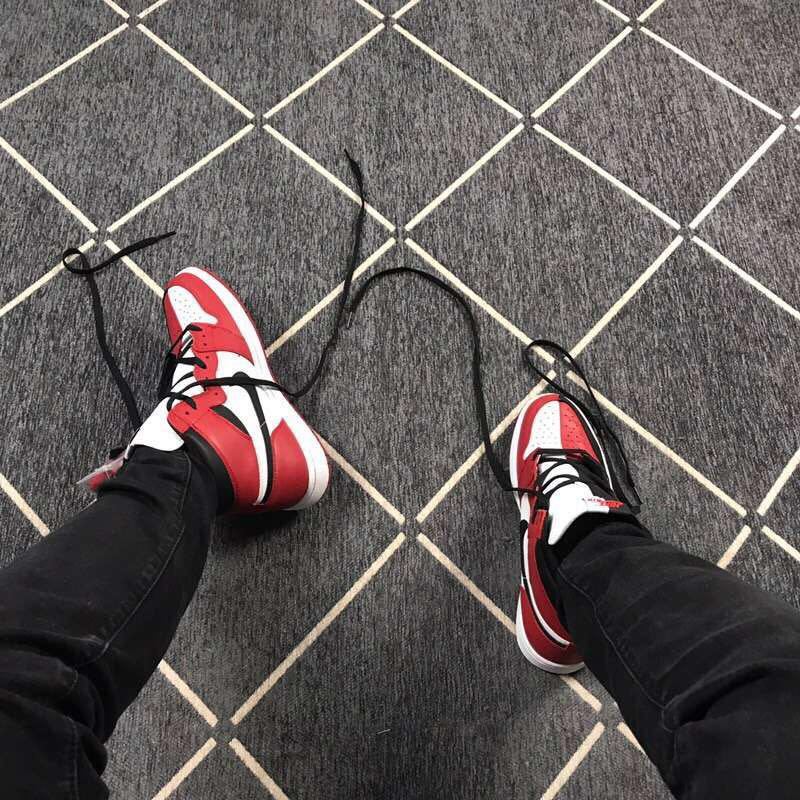 Air Jordan 1 High Sneakers in Black Red White - product image from the listing.