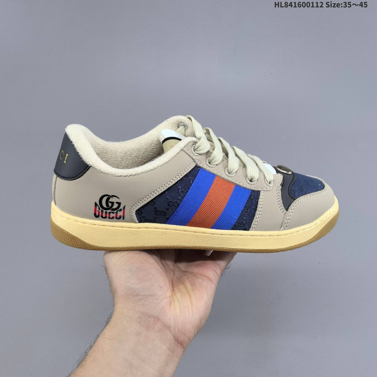 Beige and Navy Gucci Screener Distressed Low-Top Sneakers - product image from the listing.