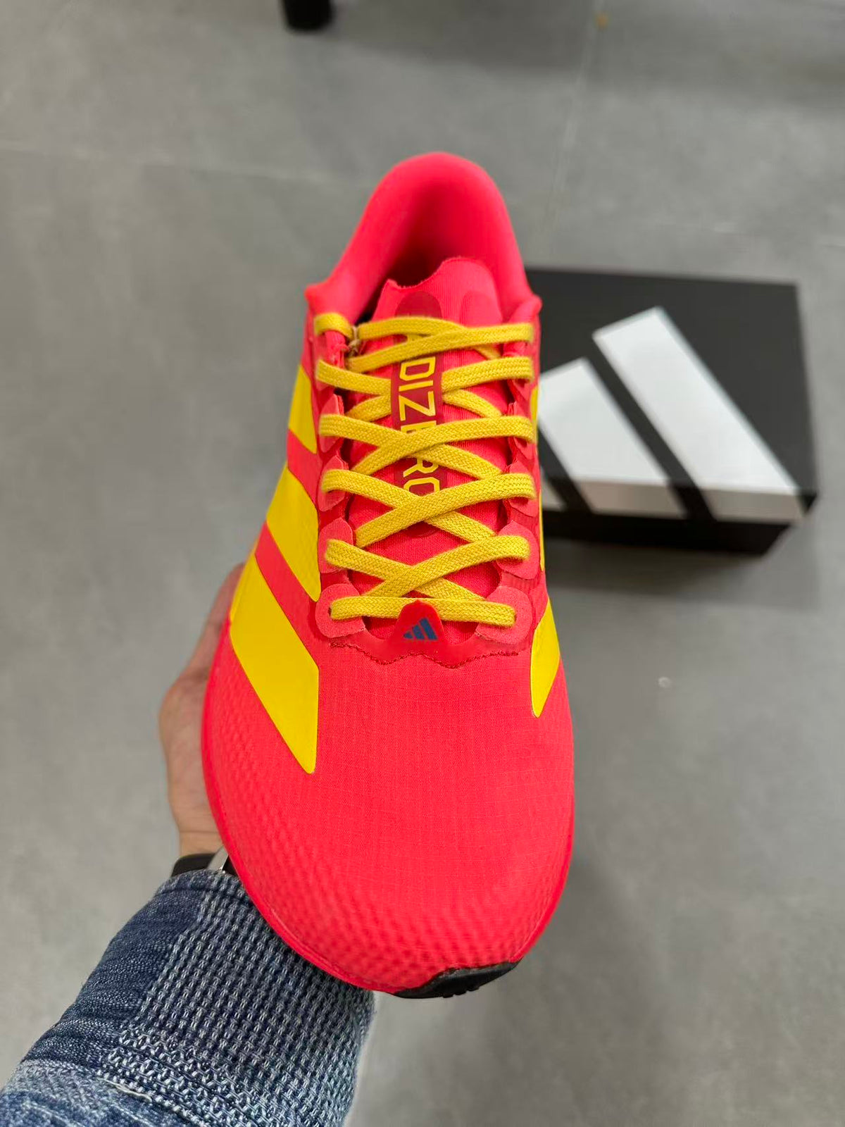 Adidas Lightstrike Pro Running Shoes in Red Yellow JQ4442 - product image from the listing.