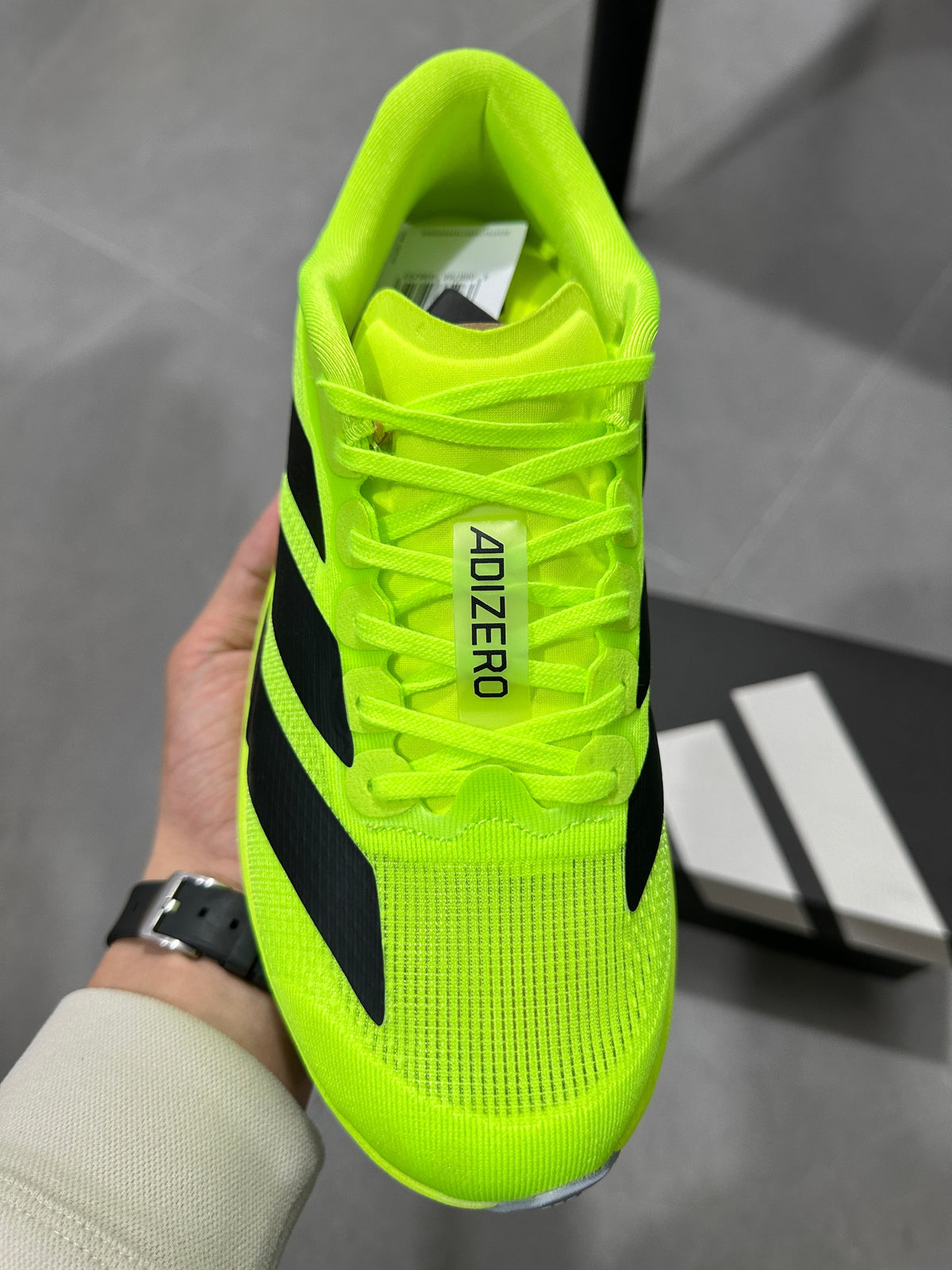 Adidas Adizero Lightstrike Pro Running Shoes, Neon in Green - product image from the listing.