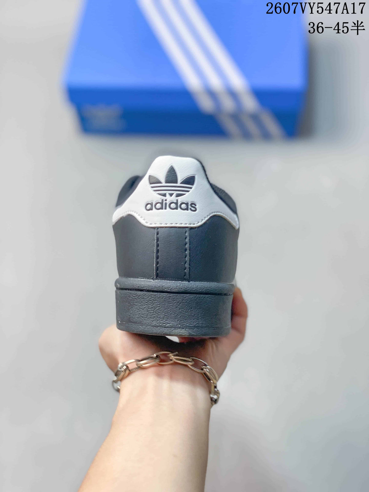 Adidas Originals Superstar Sneakers in Black and White - product image from the listing.