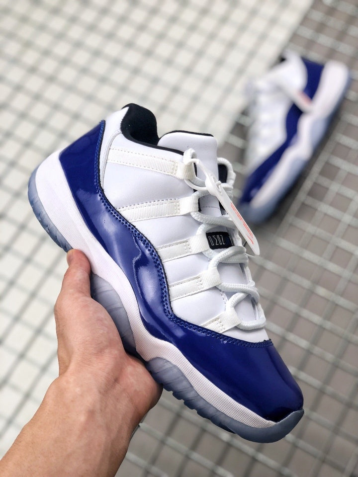 Air Jordan 11 Sneakers in White and Deep Blue BQ3685-001 - product image from the listing.