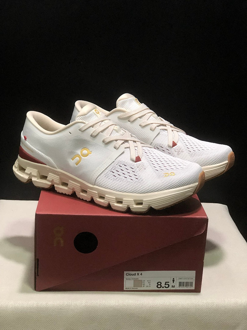 On Cloud X 4 Year of the Snake Sneakers in Ivory Cream - product image from the listing.