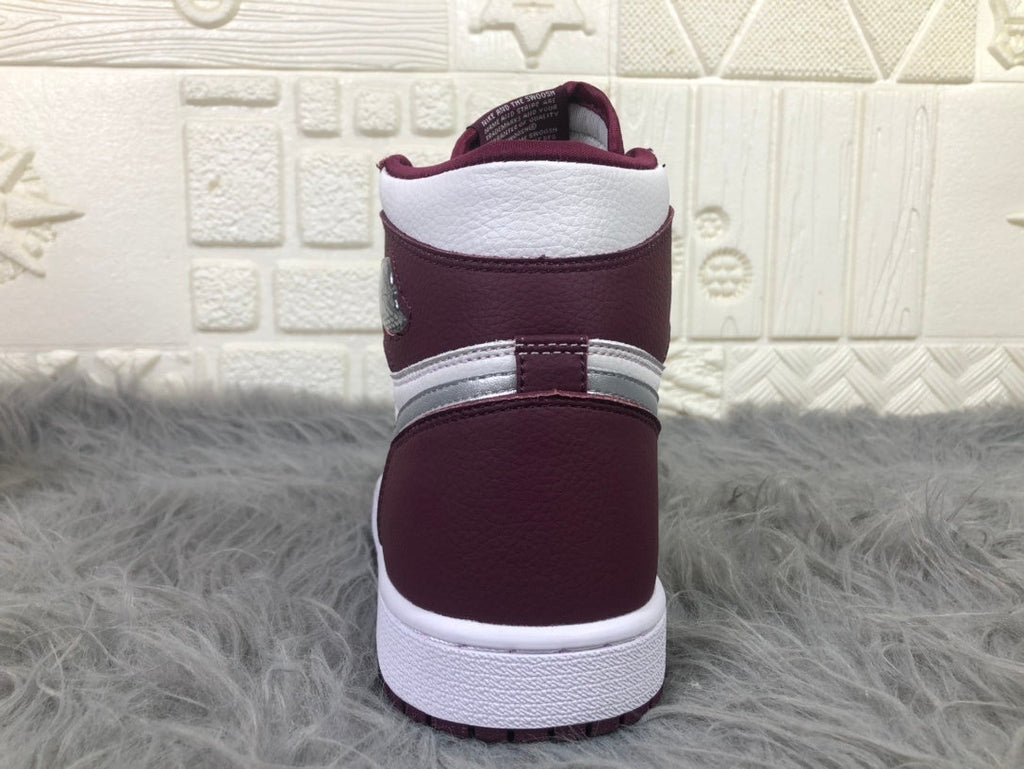 Nike Air Jordan 1 Retro High OG Sneakers in Bordeaux 555088-611 - product image from the listing.