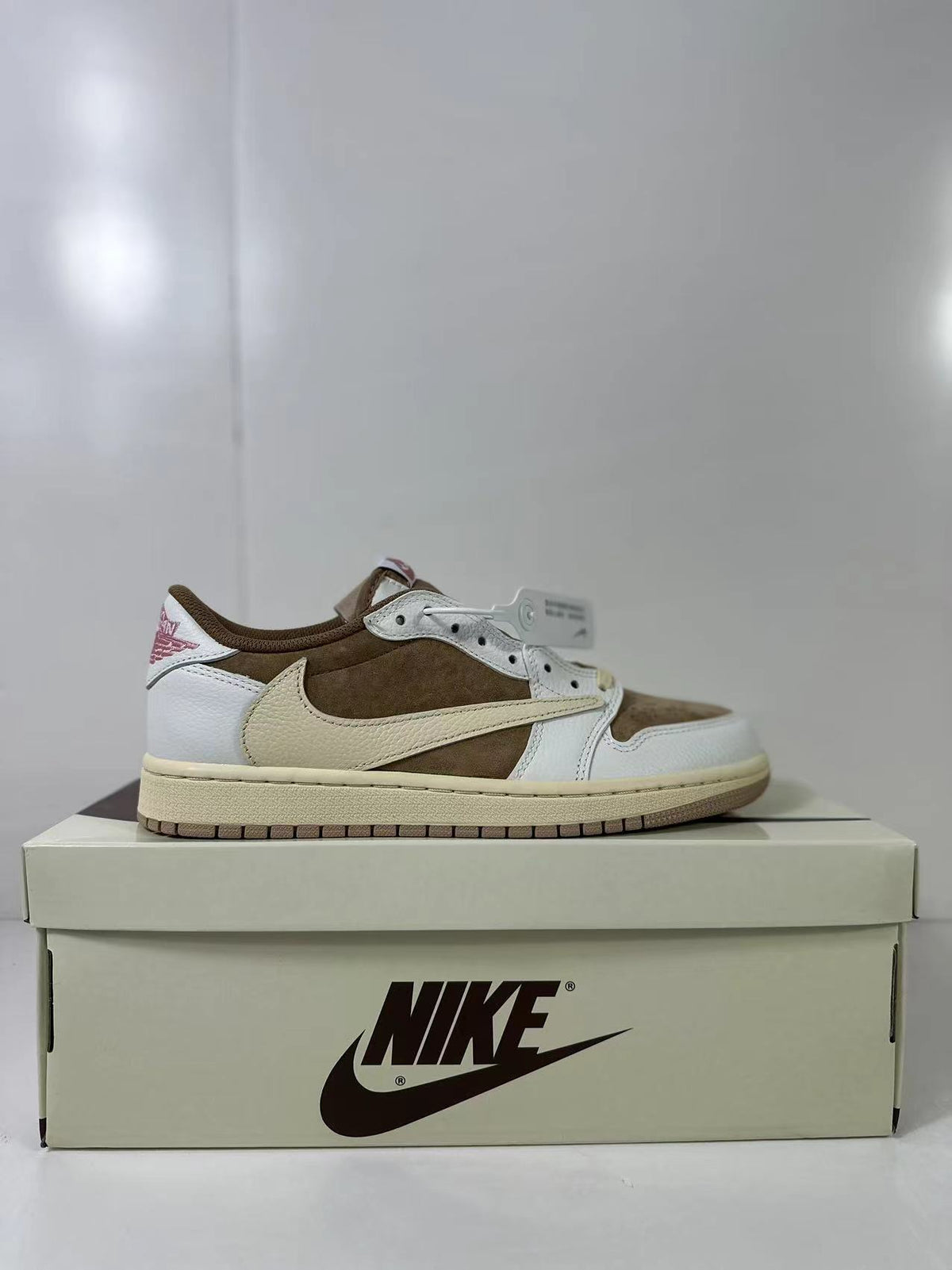 Travis Scott x Air Jordan 1 Low Reverse in Mocha Pink DM7866-106 - product image from the listing.