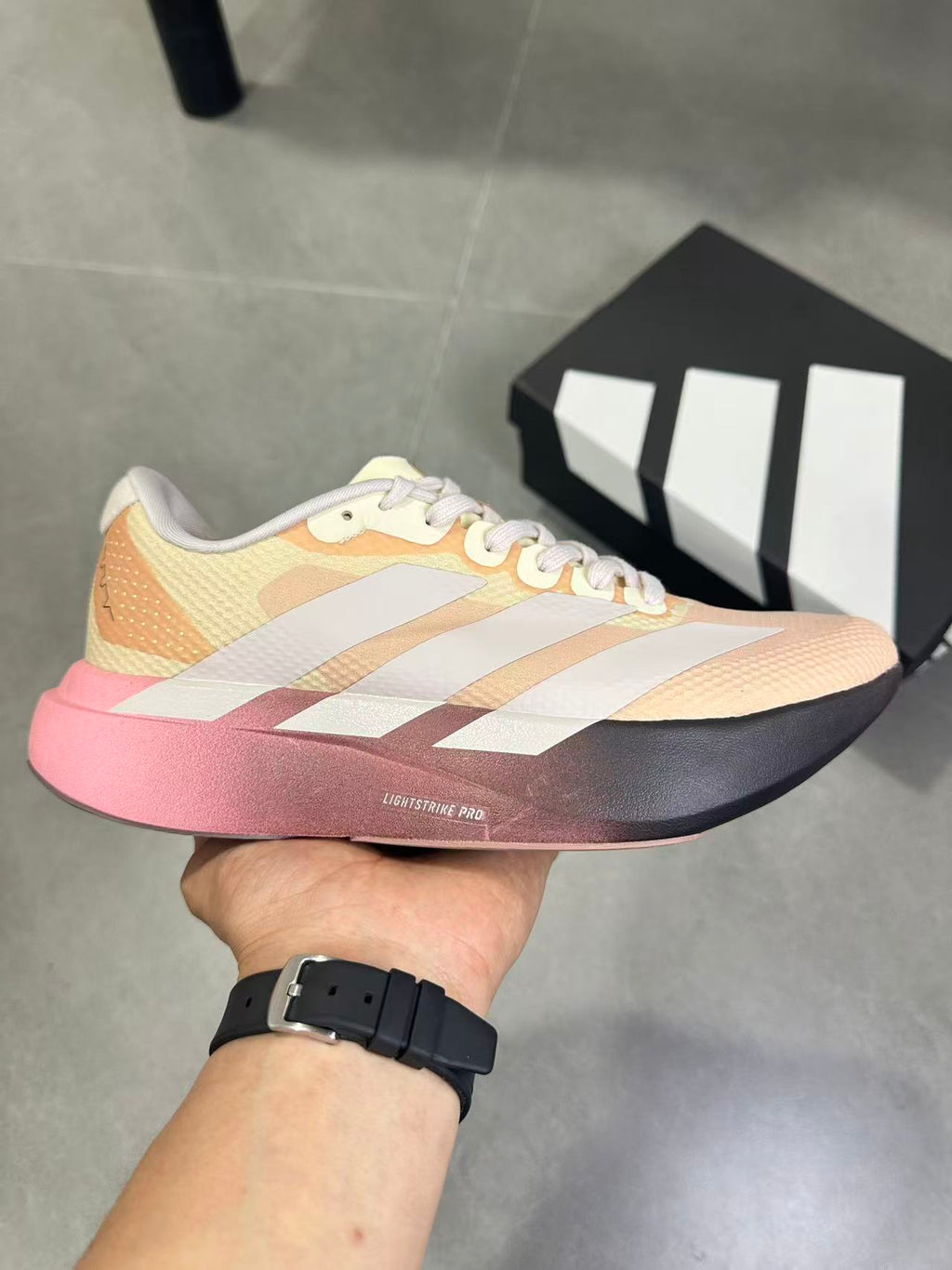 adidas Lightstrike Pro Running Shoes in Pink and Black KK5018 - product image from the listing.