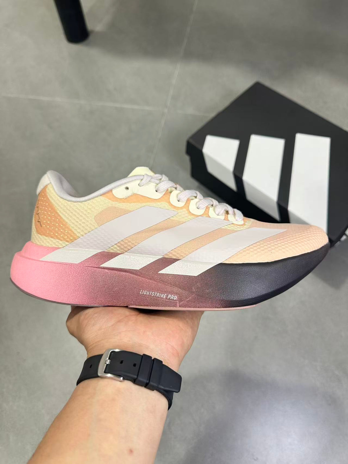 adidas Lightstrike Pro Running Shoes in Pink and Black KK5018 - product image from the listing.