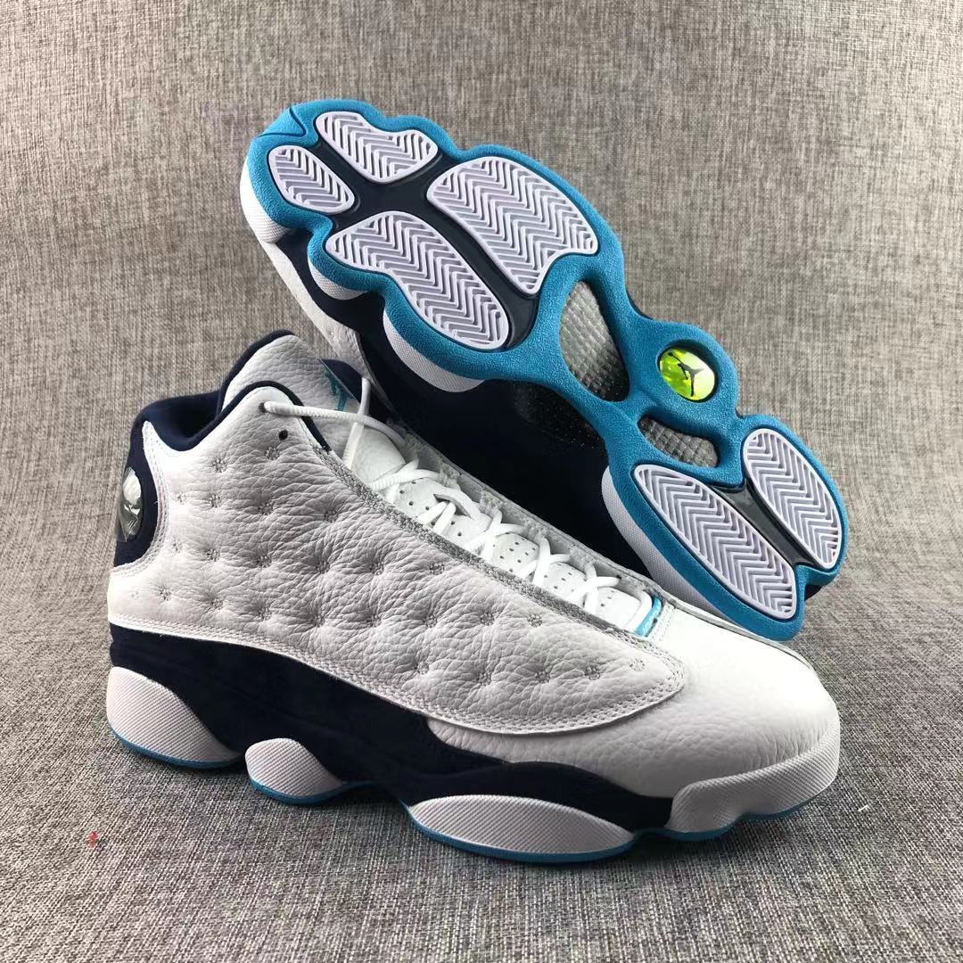 Air Jordan 13 Dark Powder Blue Sneakers White Navy - product image from the listing.