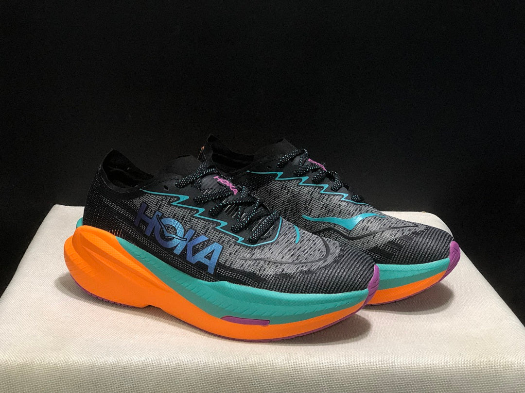 HOKA Mach X 2 Running Shoes, in Black and Turquoise - product image from the listing.