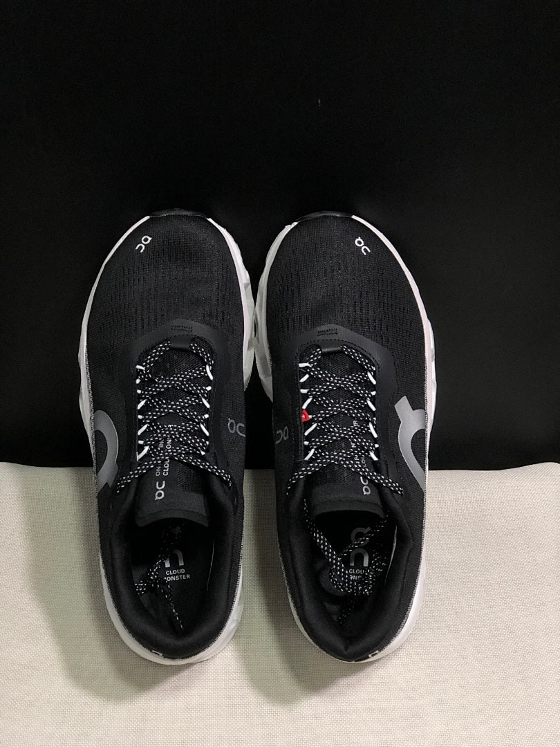 On Cloudmonster 2 Running Shoes in Black White - product image from the listing.