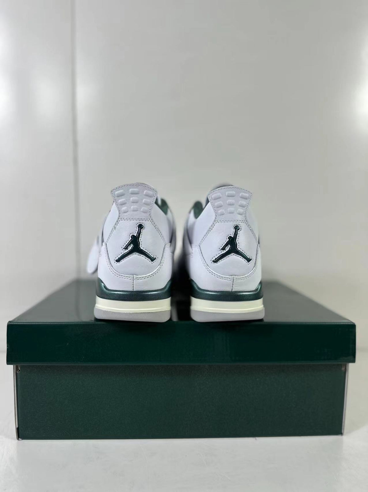 Air Jordan 4 Retro Bucks White Green Sneakers FQ8138-103 - product image from the listing.