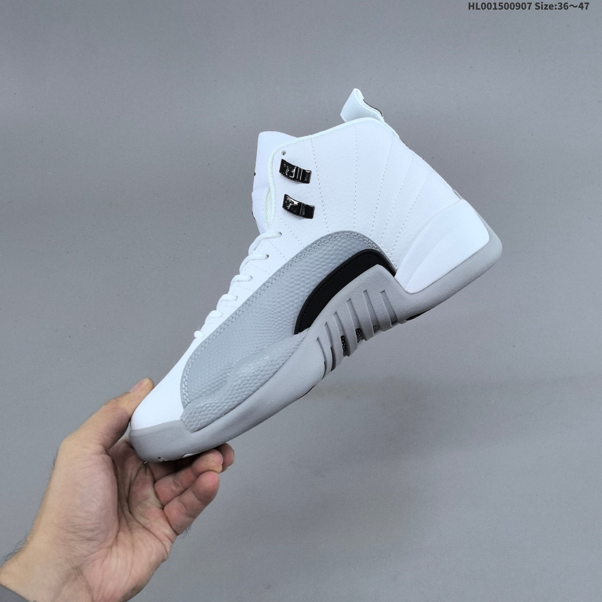 Air Jordan 12 Retro High Barons White Grey Sneakers - product image from the listing.