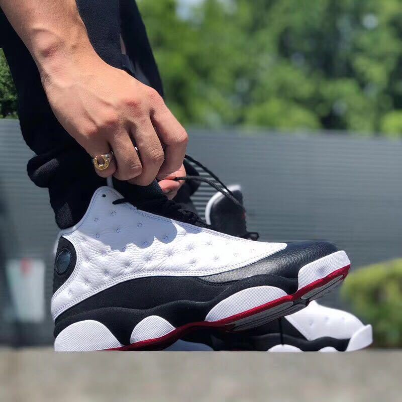 Air Jordan 13 He Got Game Sneakers in Black White Red - product image from the listing.