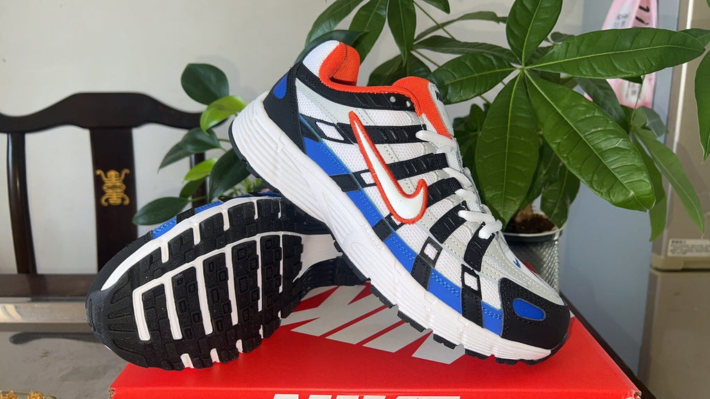 Nike P-6000 Sneakers in White Black Blue CD6404-008 - product image from the listing.