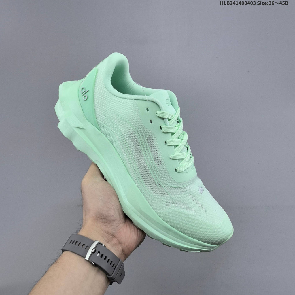 Mint Green Alo Yoga Alo Runner Low-Top Sneakers - product image from the listing.