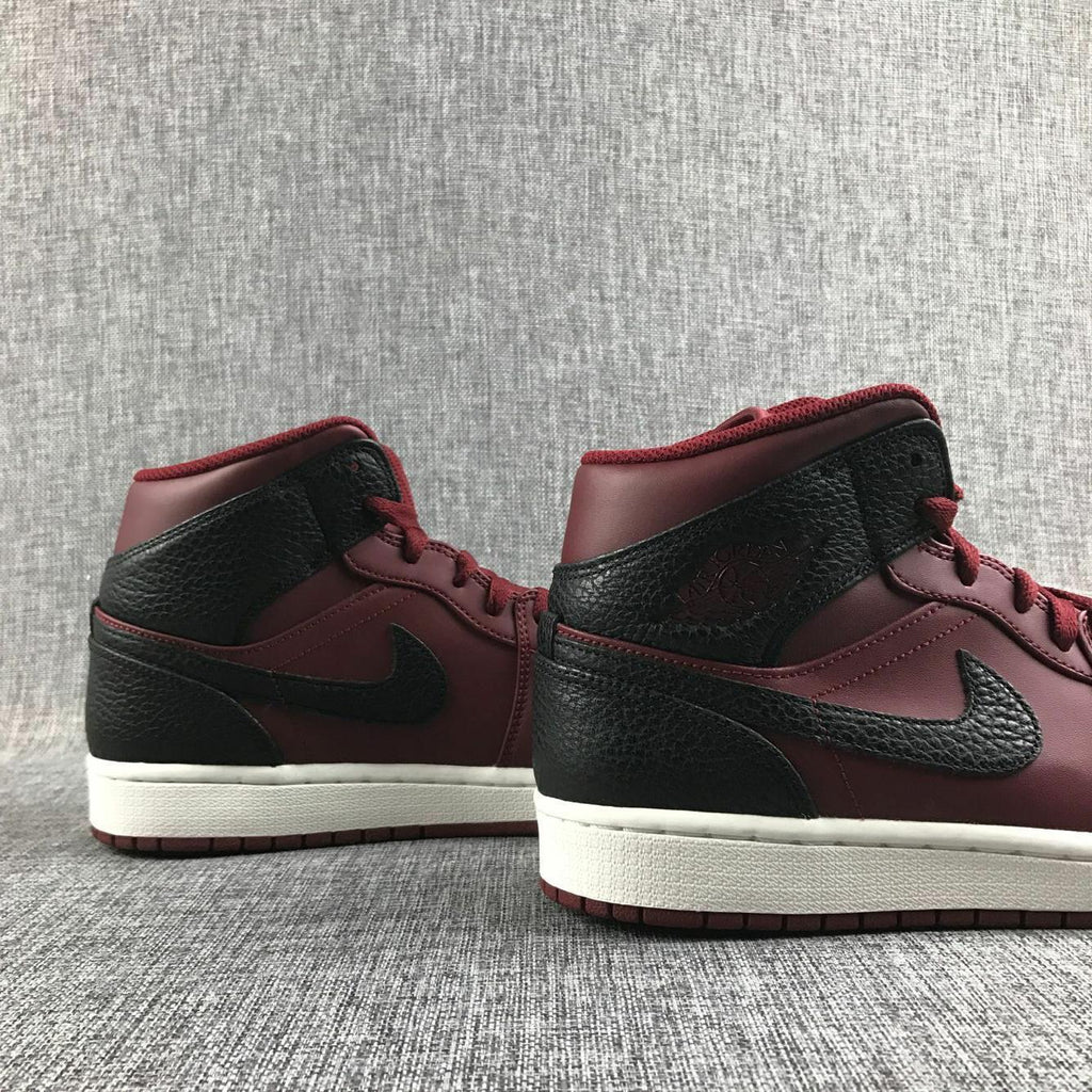 Air Jordan 1 Mid Sneakers in Black and Burgundy 554724-601 - product image from the listing.