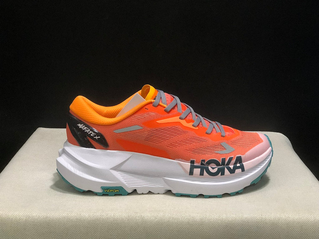 Orange HOKA Mafate X Trail Running Shoes - product image from the listing.
