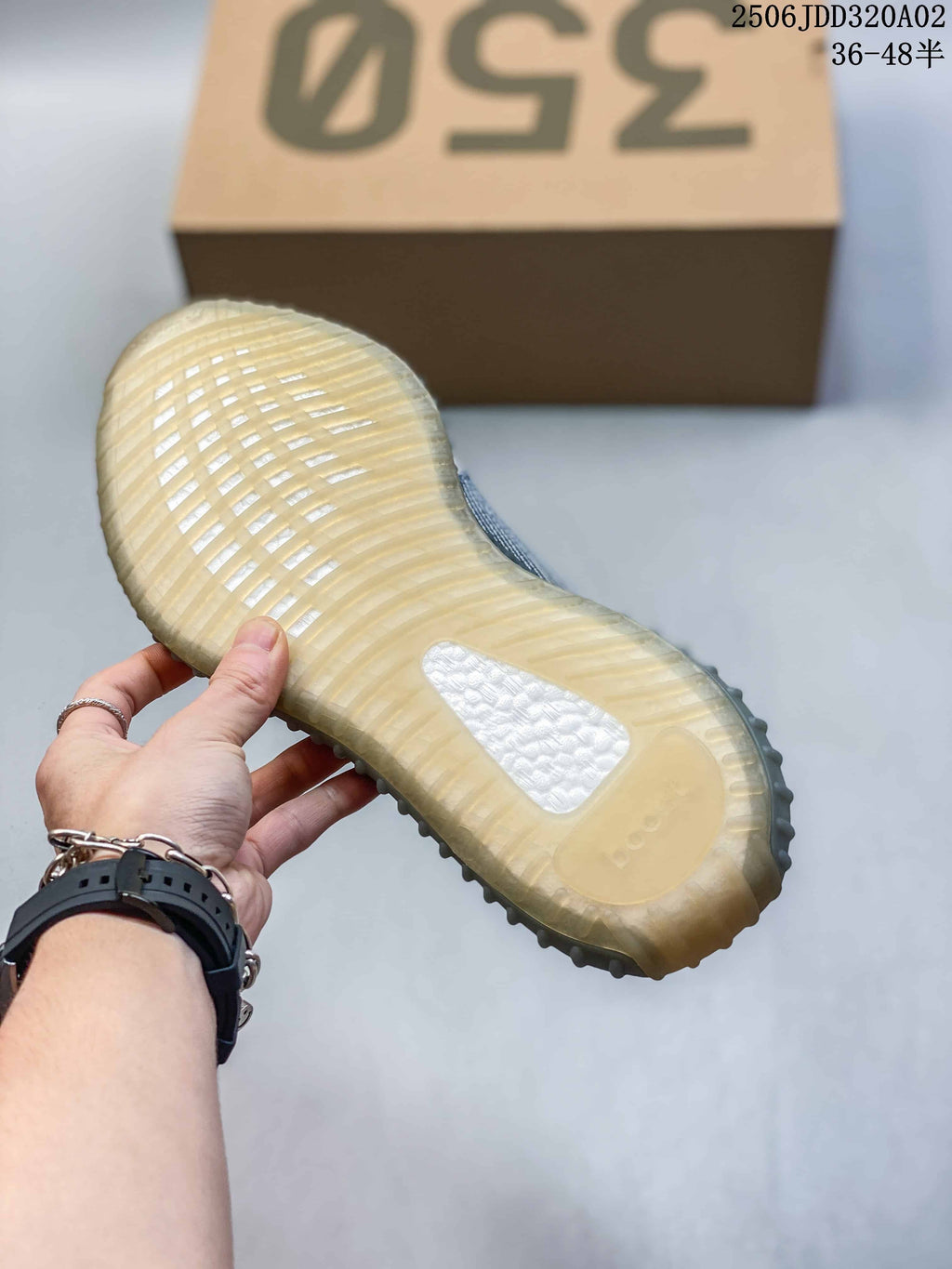 Adidas Yeezy Boost 350 Sneakers in Grey and Tan - product image from the listing.