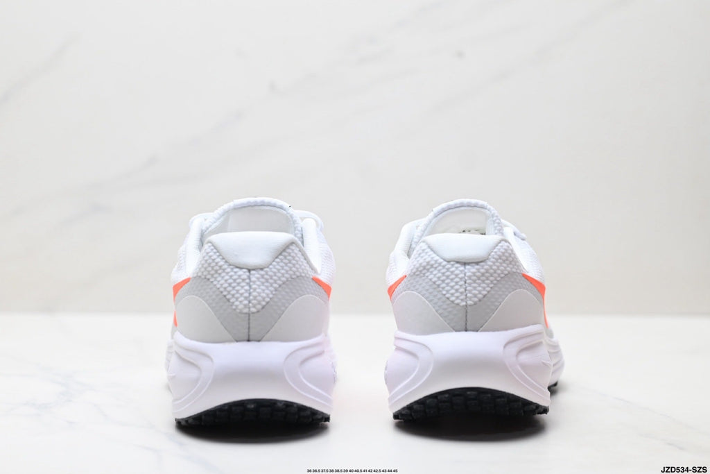 Nike Revolution 8 Running Shoes in White and Orange - product image from the listing.