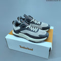 Timberland Trail Trainers in Gray with Orange Accents - product image from the listing.