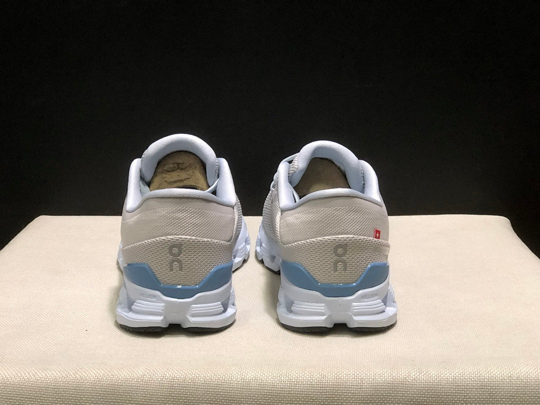 Silver and Blue On Cloud X 4 Sneakers - product image from the listing.