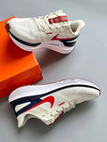 Nike Structure 25 Road Running Shoes, in Sail Red DJ7883-001 - product image from the listing.