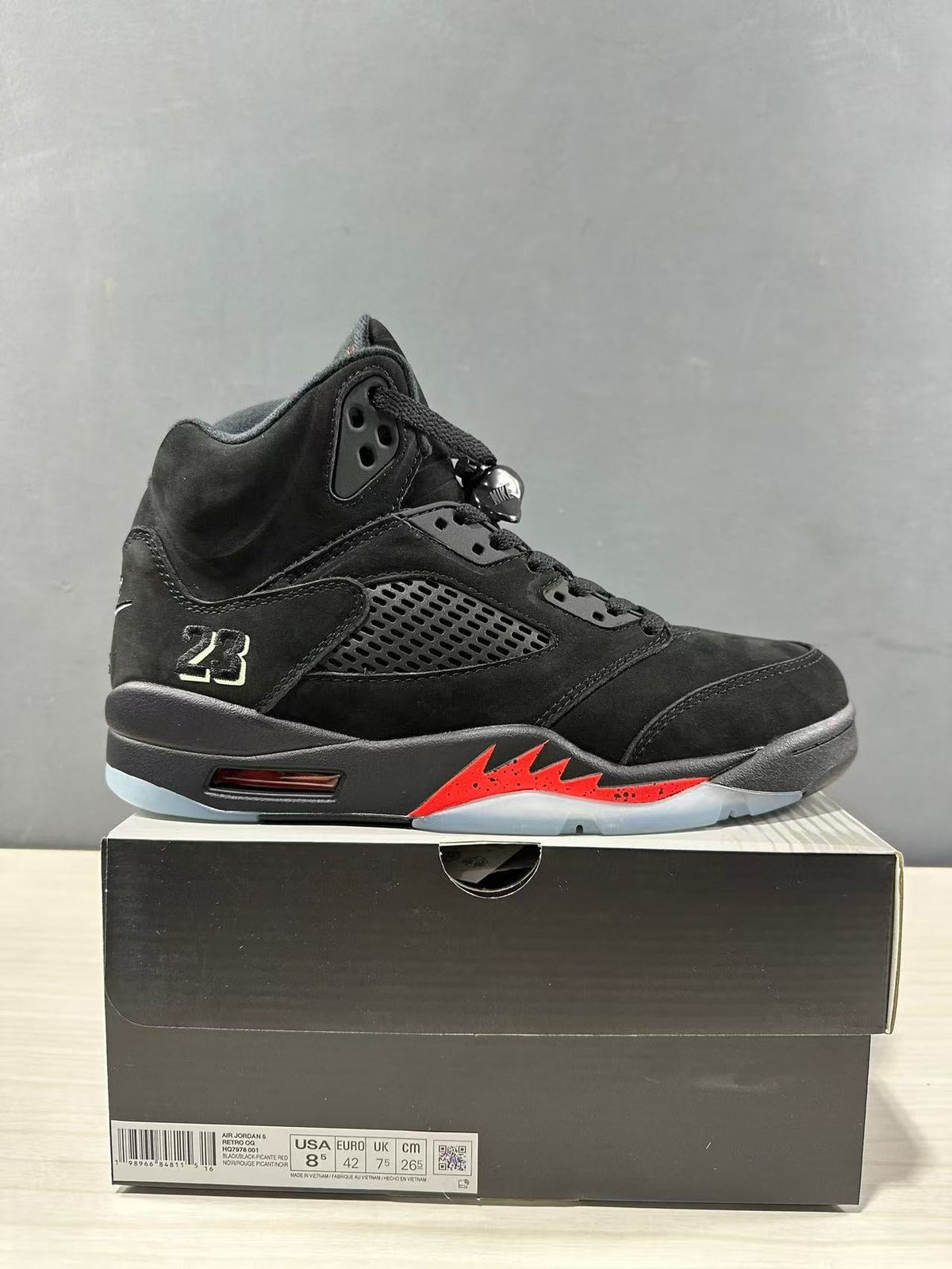 Air Jordan 5 Retro Sneakers Black and Red - product image from the listing.