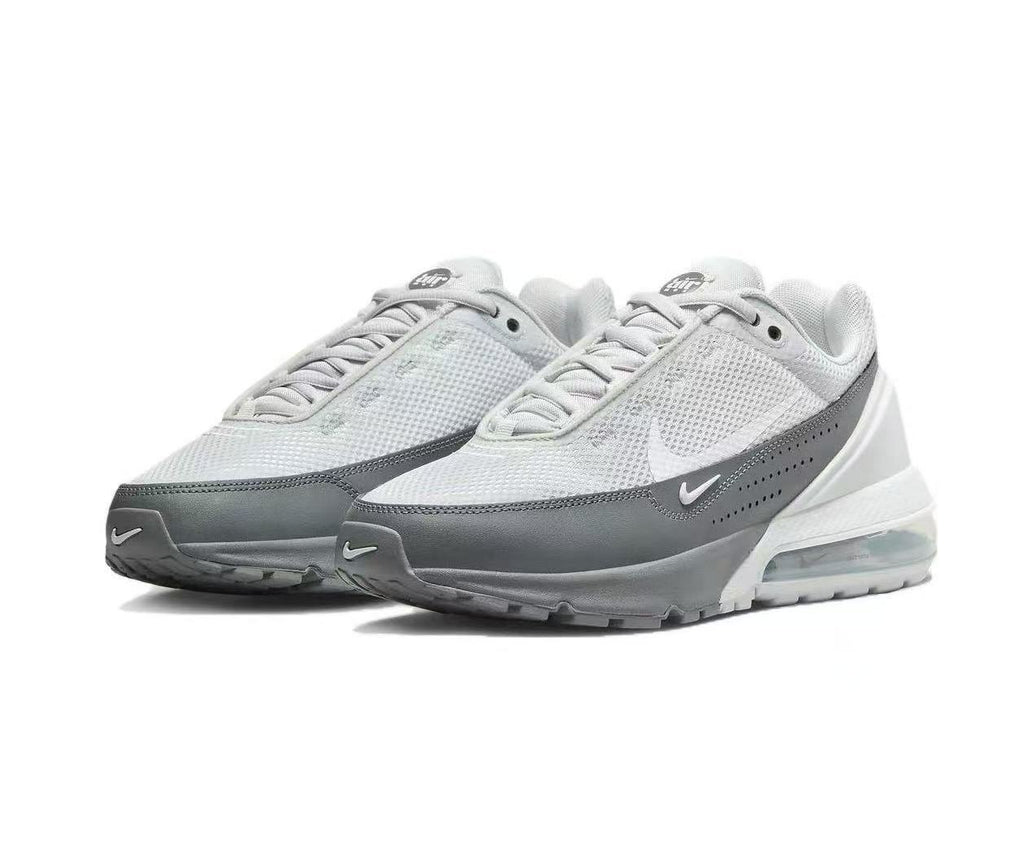 Nike Air Max 2090 Sneakers in White and Dark Grey - product image from the listing.