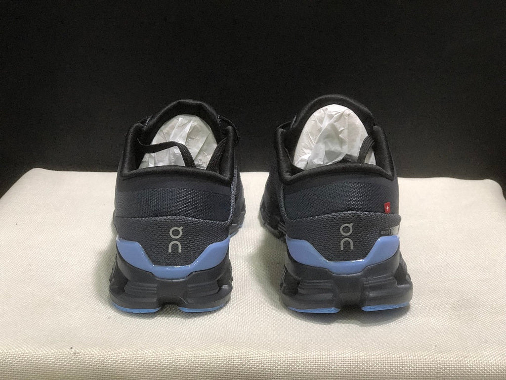 On Cloud X 4 Running Sneakers in Navy - product image from the listing.