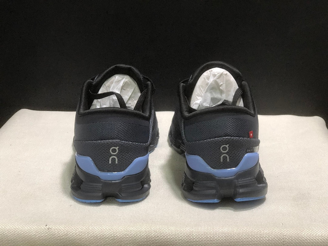 On Cloud X 4 Running Sneakers in Navy - product image from the listing.