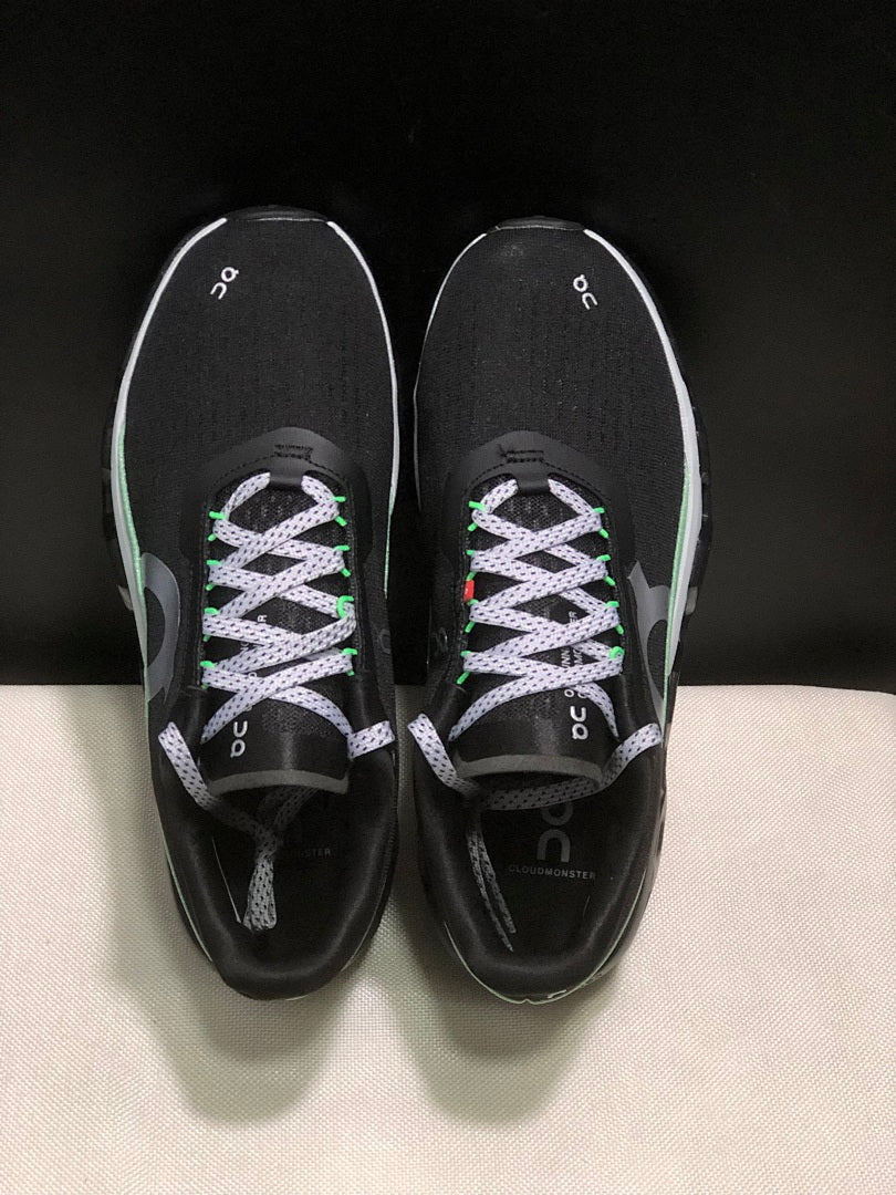 On Cloudmonster 2 Running Sneakers in Black Green - product image from the listing.