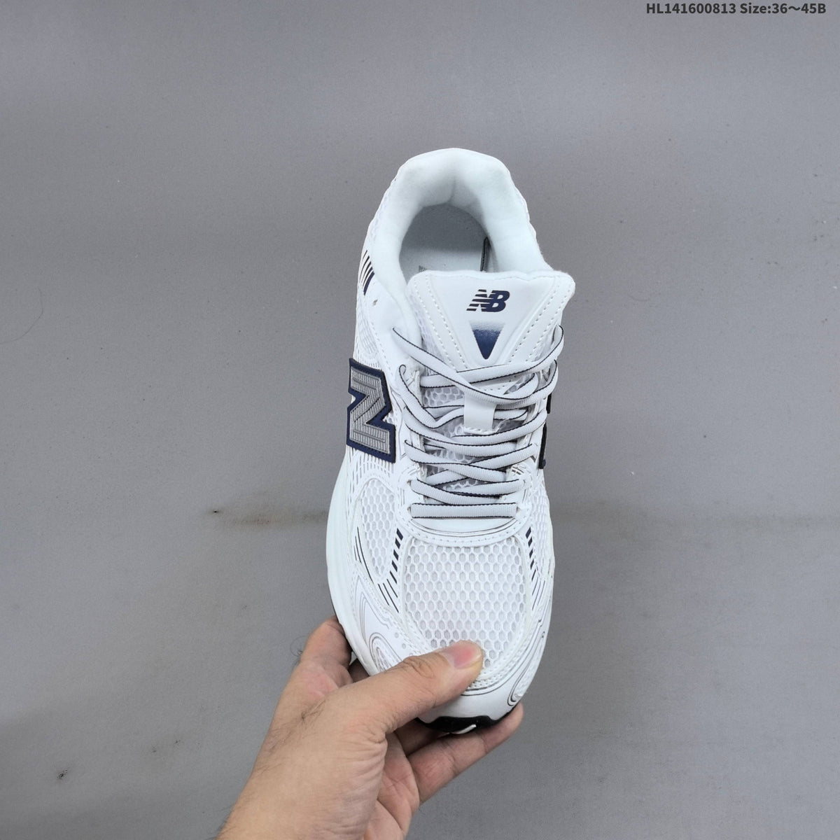New Balance 2010 Mesh Running-Style Sneakers, in White and Navy - product image from the listing.