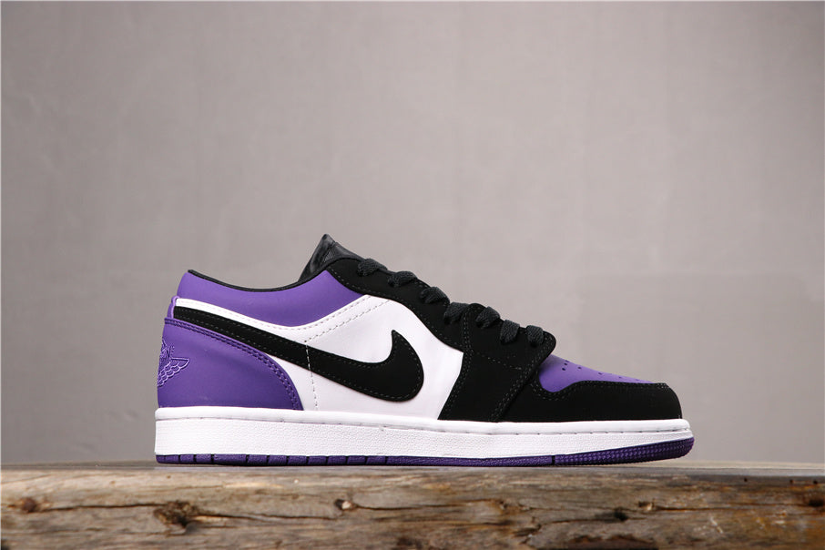 Air Jordan 1 Low Sneakers in White Black Orange Purple 553558-125 - product image from the listing.
