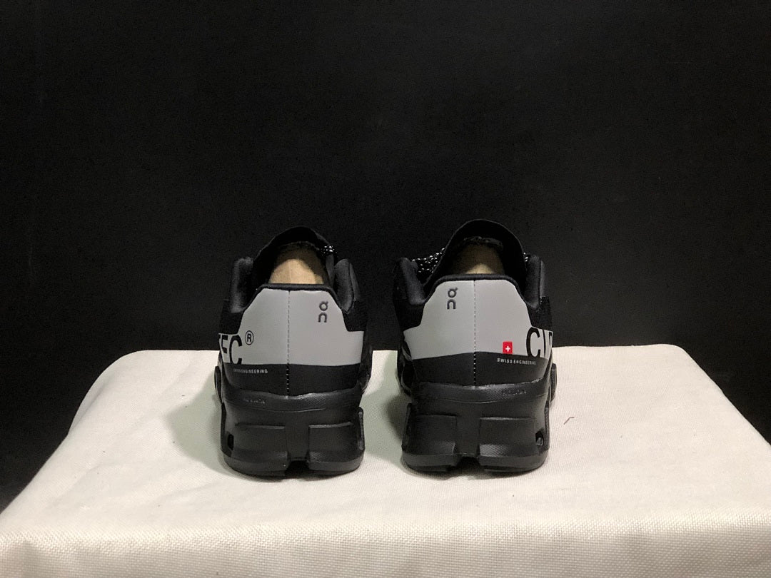 Black and Silver On Cloud X Sneakers - product image from the listing.