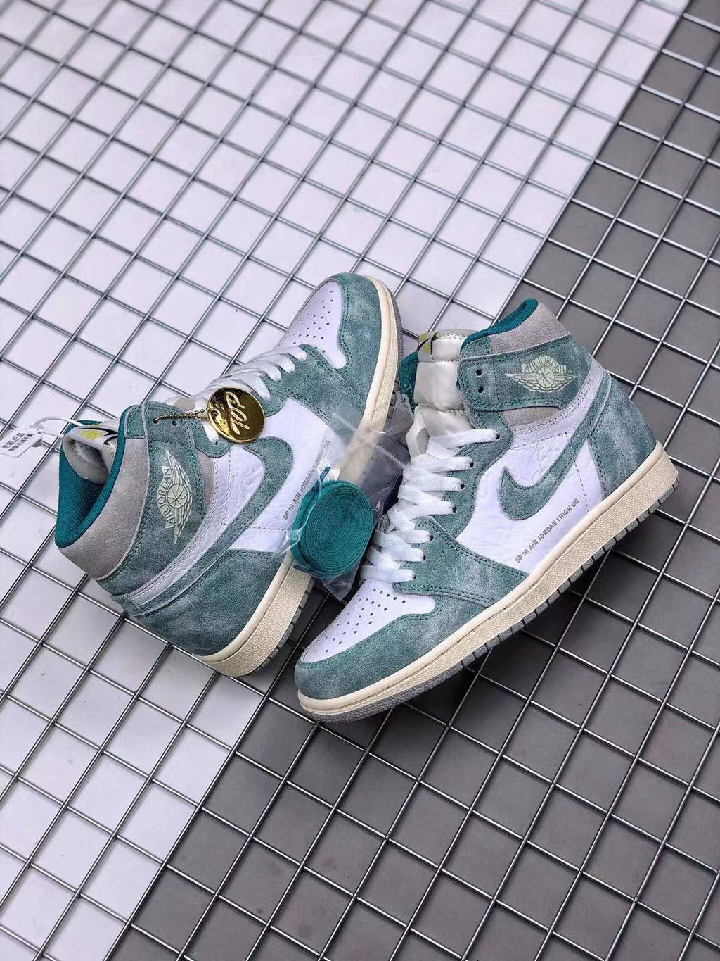 Air Jordan 1 High OG Teal and White Sneakers - product image from the listing.