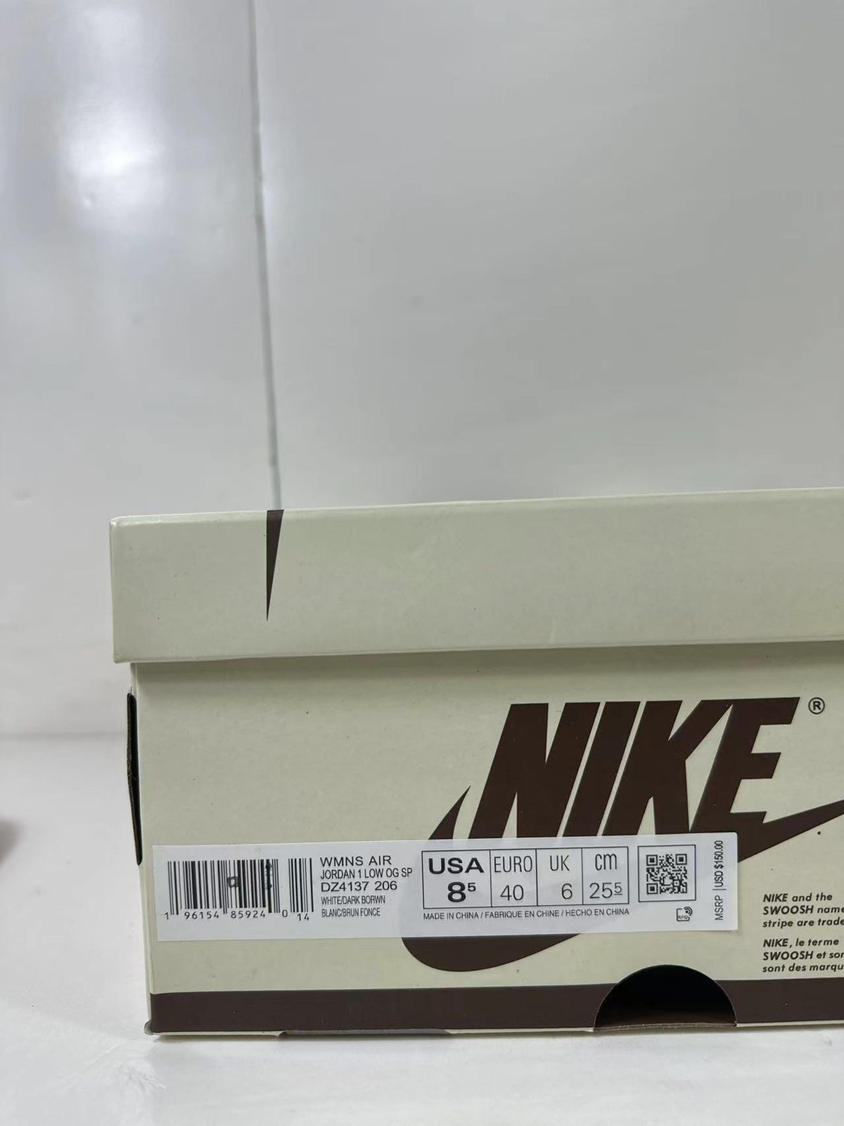 Jordan 1 Low Travis Scott in Brown White Pink DZ4137-206 - product image from the listing.