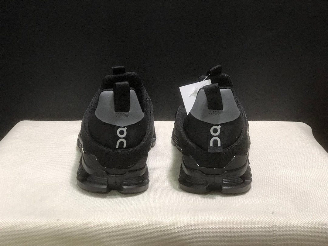 On Cloud 4 Coast Black Slip-On Trainers - product image from the listing.