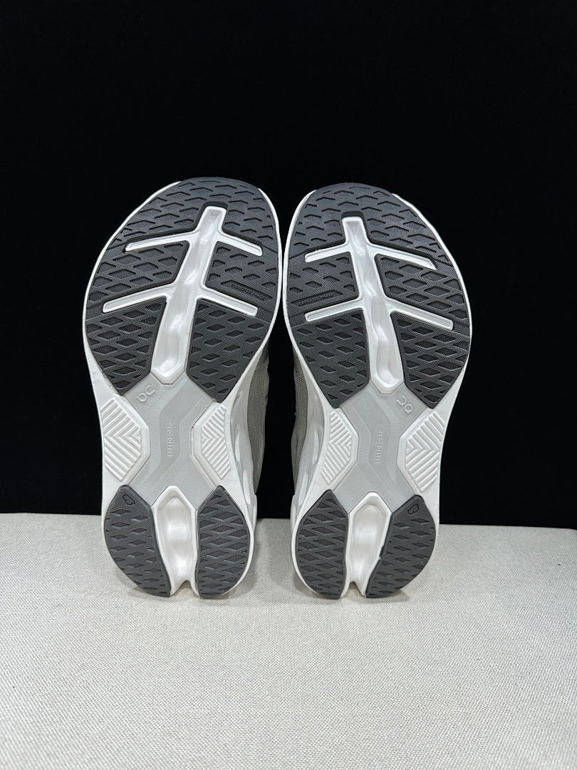 On Cloudeclipse Running Shoes, in Gray and White - product image from the listing.