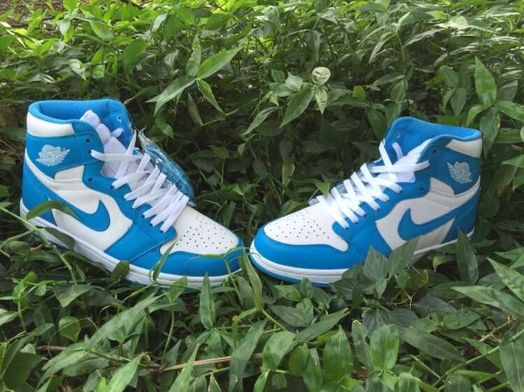 Blue and White Air Jordan 1 High Sneakers - product image from the listing.