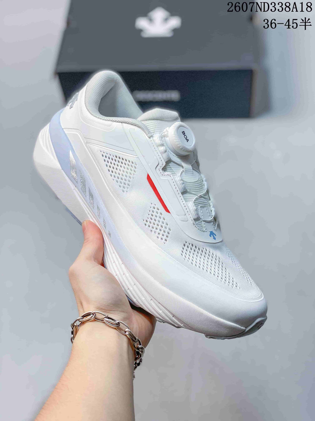 White and Black Descente D.F. Wire 3.0 Sneakers - product image from the listing.