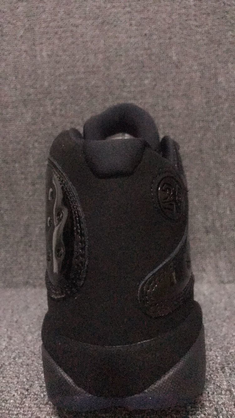 Air Jordan 13 Retro Cap and Gown Sneakers in Black - product image from the listing.