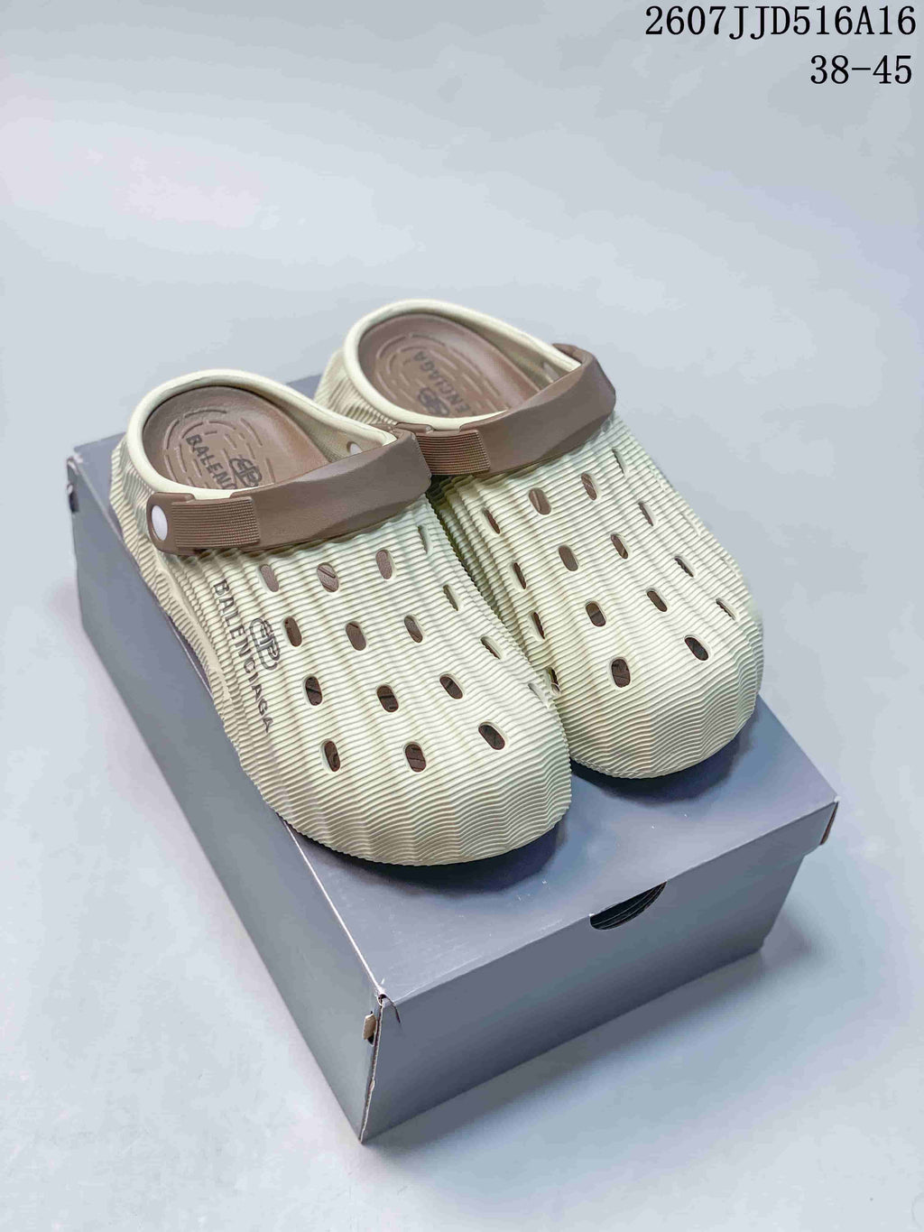 Balenciaga Molded Clog Slides in Cream Brown 2607JJD516A16 - product image from the listing.