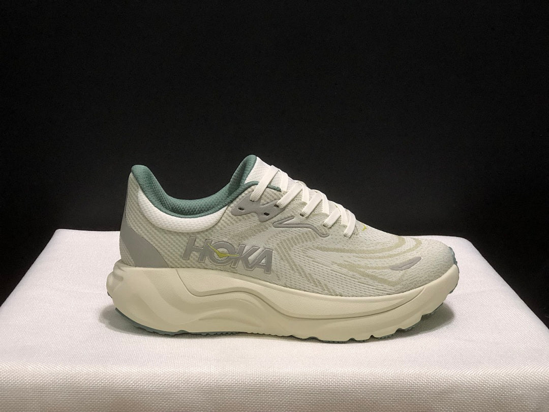 HOKA Arahi 8 Shoes for Running in Cream and Sage - product image from the listing.