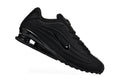 Nike Shox R4 Sneakers in Black - product image from the listing.