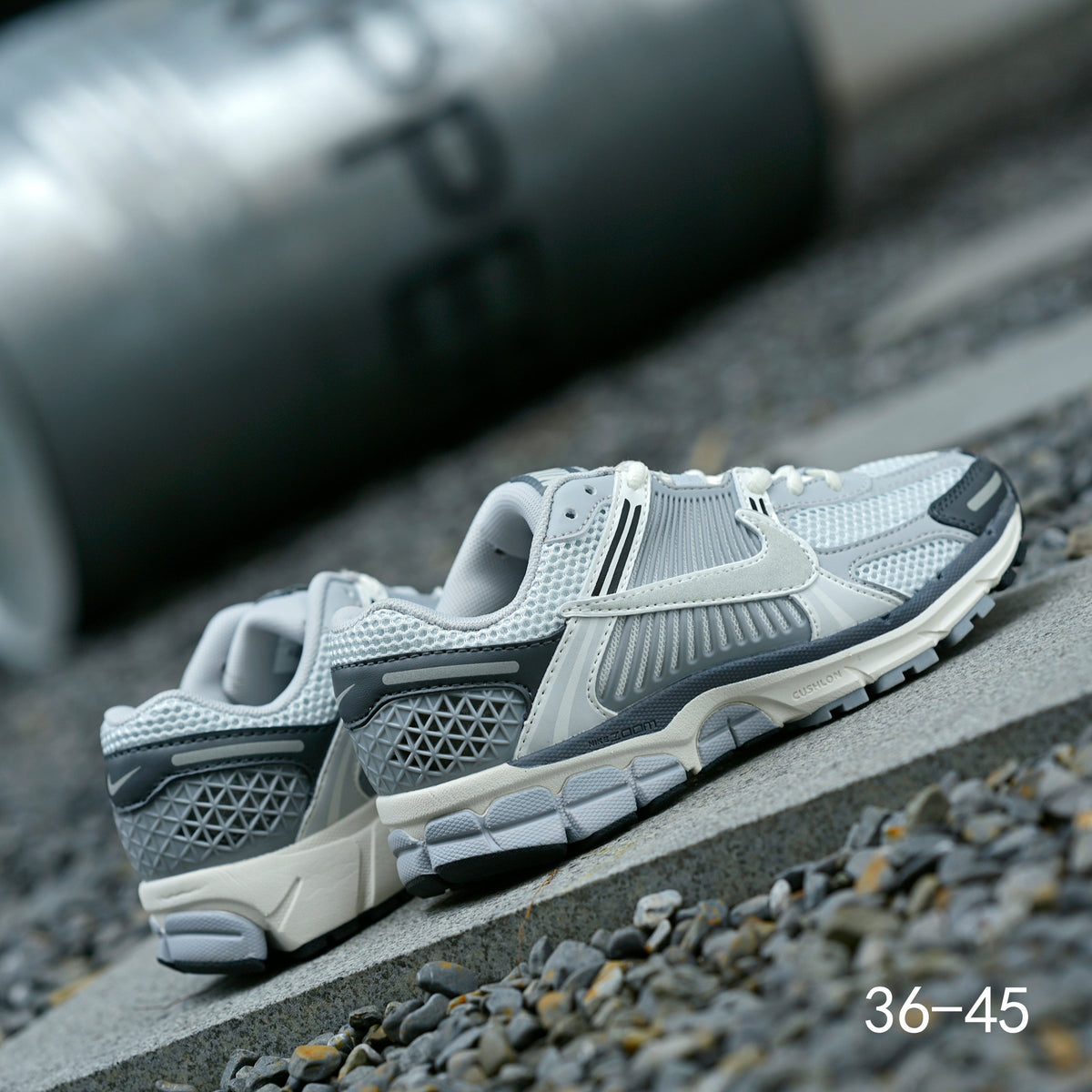 Light Gray and Navy Nike Air Zoom Vomero 5 Sneakers - product image from the listing.
