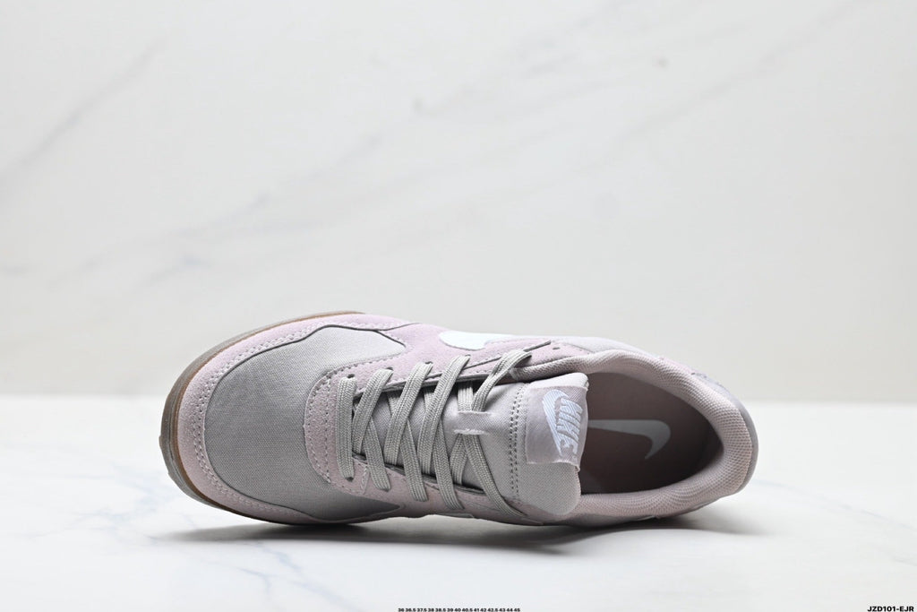 Grey and White Nike Terra Manta Sneakers - product image from the listing.