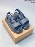 GoldenGlow Black Platform Sandals 2607JDD245A15 by UGG - product image from the listing.